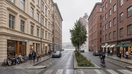 Bild på gata med höghus på båda sidor