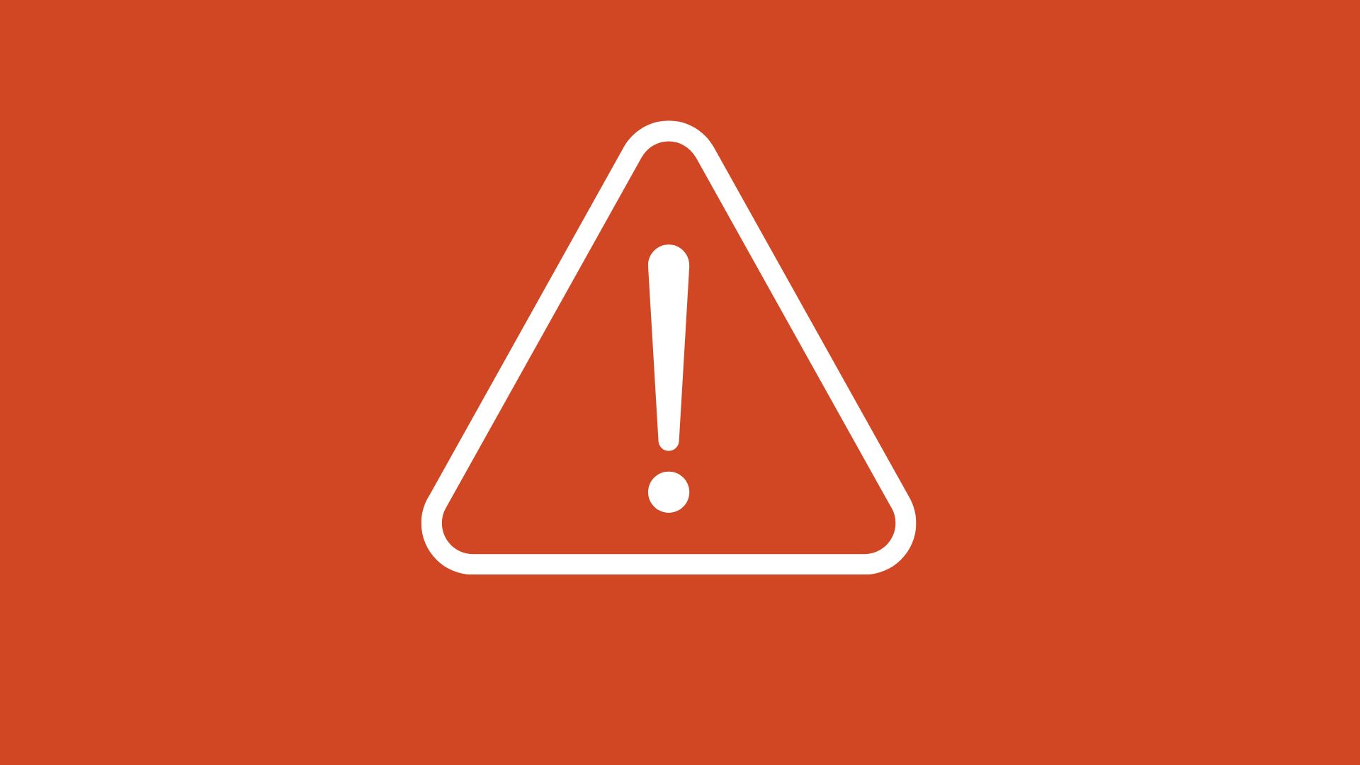 En vit varninstriangel med ett utropstecken mot orange bakgrund.