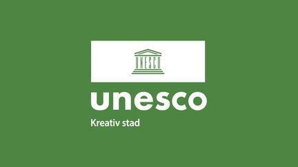Unesco Kreativ Stad - symbol på grönt