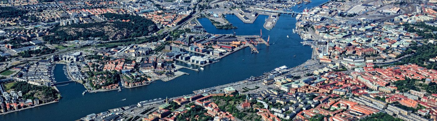Flygfoto över Göta älv. På bild syns centrala Göteborg, hisingen och hamnområdet.