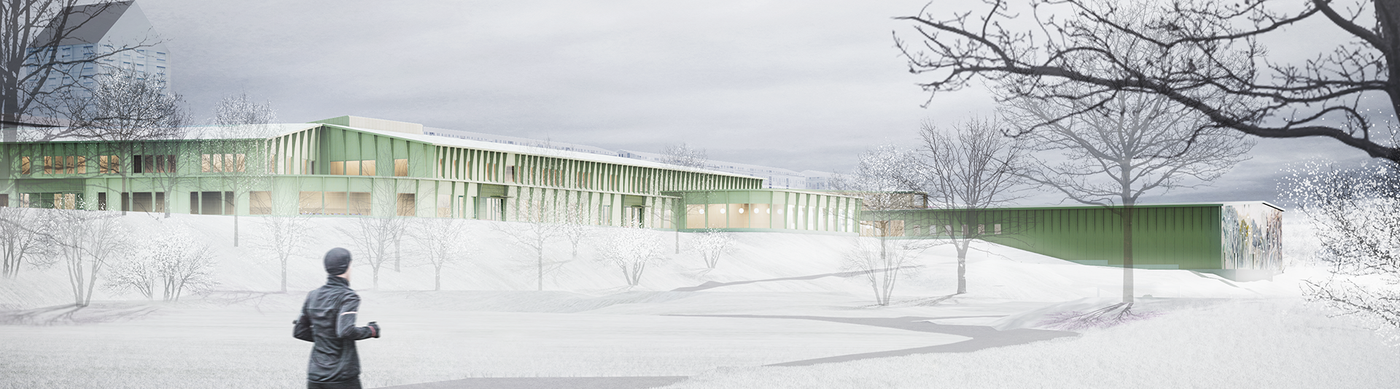 En grön skolbyggnad sträcker sig över horisonten mot ett vitt vinterlandskap.