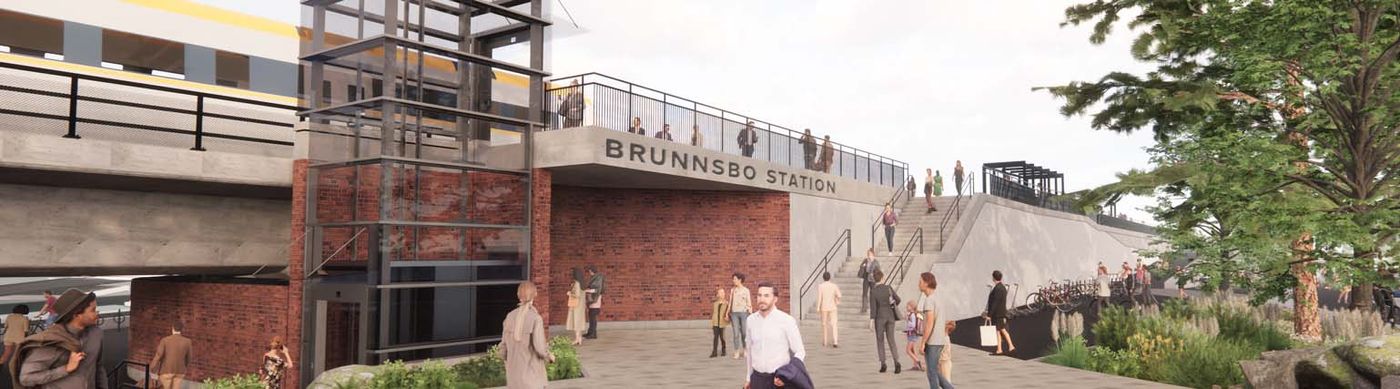 Bilden visar nya Brunnsbo Station med spårvagnar, busshållplatser och människor