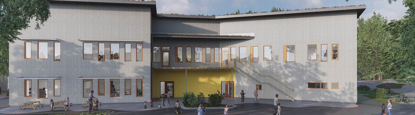 Bild på förskola med grå fasad och gul entré. Utanför står barn och leker.