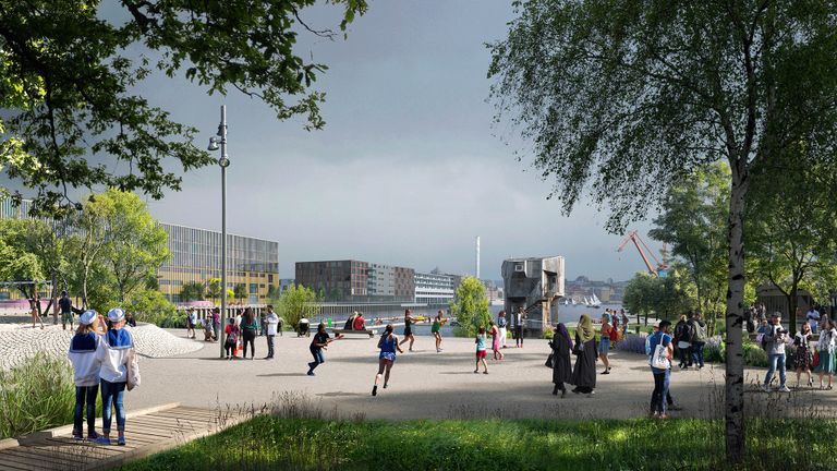 Barn leker i jubileumsparken. I bakgrunden syns den nya bastun.