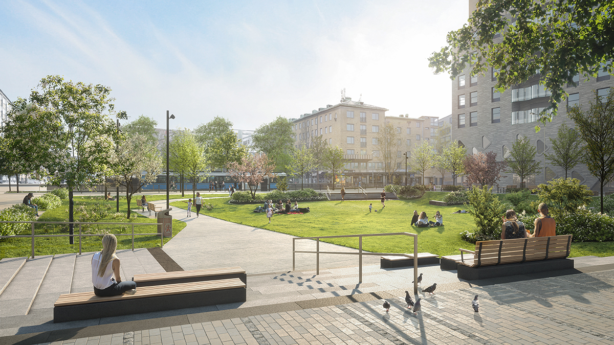 Vy över en grön park med bänkar och träd. En bostadsfastighet syns till höger. 