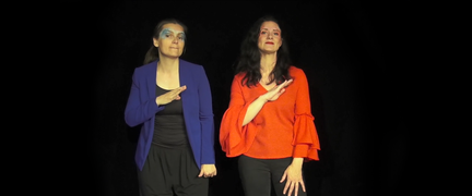 Två personer står och tecknar