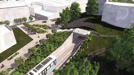 En enkel visionsbild som visar när spårvägen går ner under jord. Med mycket grönska rund tråget där spåret går in i ett tunnelhål.