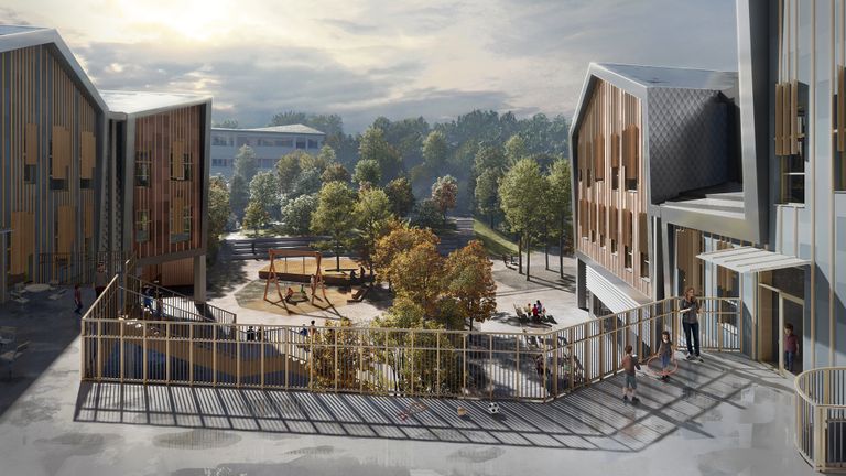 skola i brunt och grått med lekplats