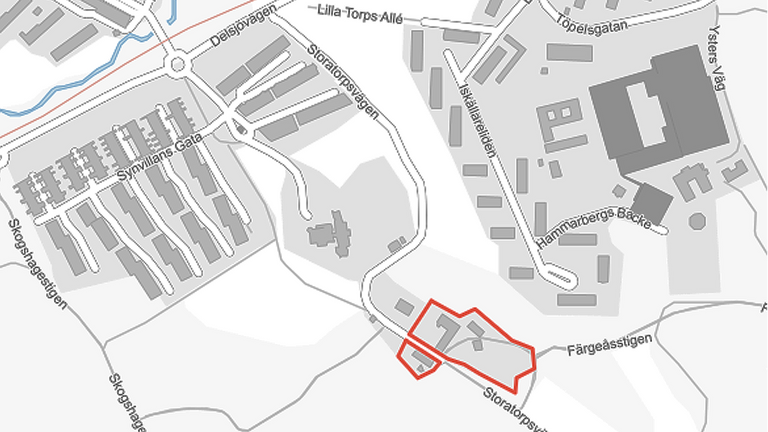 Karta över fastighetsgränser där Stor Torp är inringat med röd färg.
